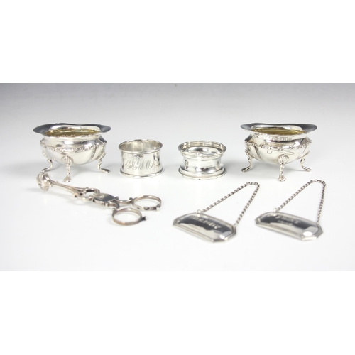 154 - A pair of Victorian silver open salts Levesley Brothers, London 1898, each raised on scroll pad feet... 