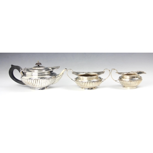 157 - A Victorian silver three piece tea service, Walter and John Barnard, London 1893, comprising a teapo... 