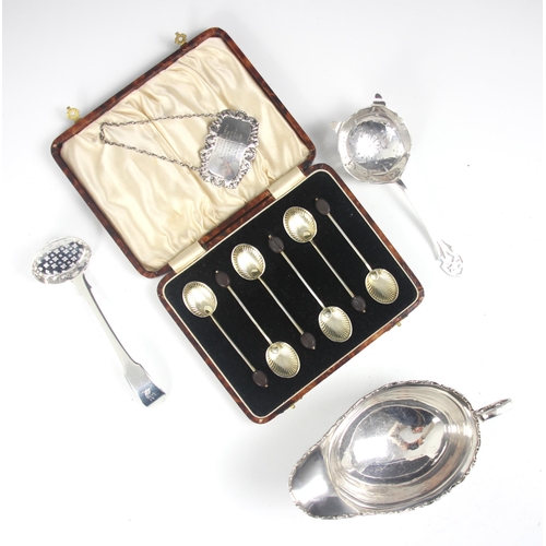 158 - A George III silver fiddle pattern sugar sifter, spoon probably London 1812, along with a silver tea... 