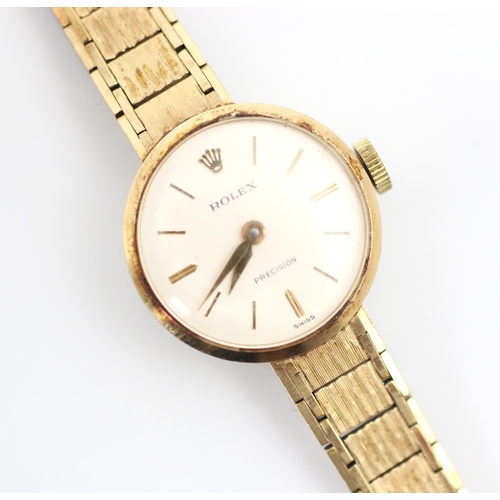 201 - A ladies 9ct yellow gold Rolex Precision wristwatch, the circular white dial with baton markers, set... 