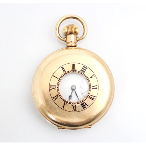 206 - A yellow metal half hunter pocket watch, the circular white enamel dial with Roman Numerals and subs... 