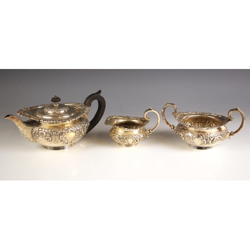 21 - An Edwardian silver three-piece tea service, Sharman Dermott Neill, London 1907, comprising sugar bo... 