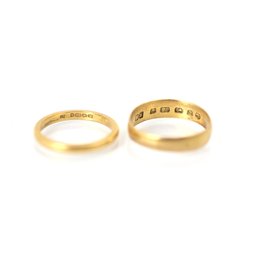 223 - A 22ct yellow gold wedding band, stamped 'HA' Birmingham 1878, ring size M, with a further 22ct yell... 