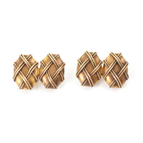 227 - A pair of gold coloured cufflinks, the oval links with double rope twist overlay detail to front, li... 