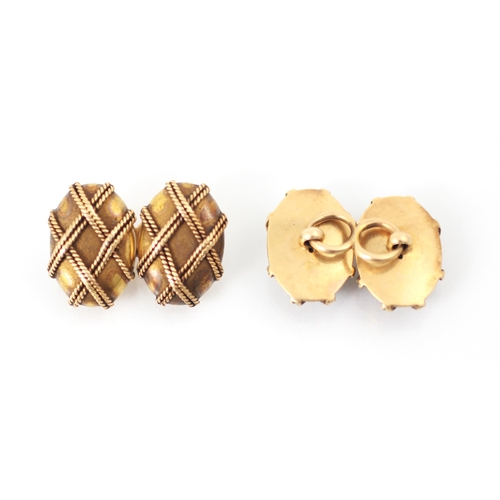 227 - A pair of gold coloured cufflinks, the oval links with double rope twist overlay detail to front, li... 