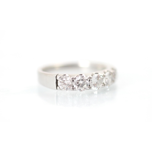 231 - A Mappin & Webb platinum five stone diamond ring, the five round cut diamonds claw set within a plat... 