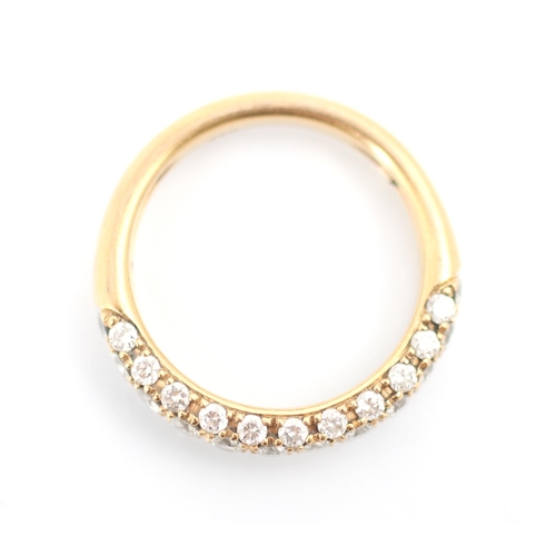 235 - A rose gold diamond half eternity, the row of twelve round cut diamonds with eleven smaller round cu... 