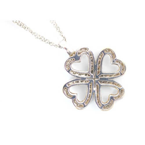 240 - A Mappin & Webb diamond set clover pendant, the pendant realistically modelled, set with sixteen rou... 