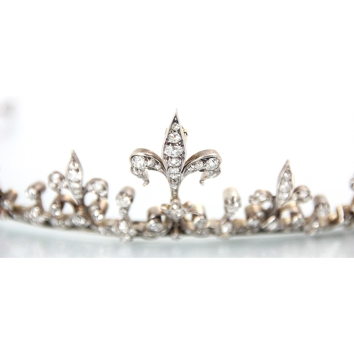 245 - A late 19th/early 20th century diamond set tiara converting to necklace, the central fleur-de-lys mo... 