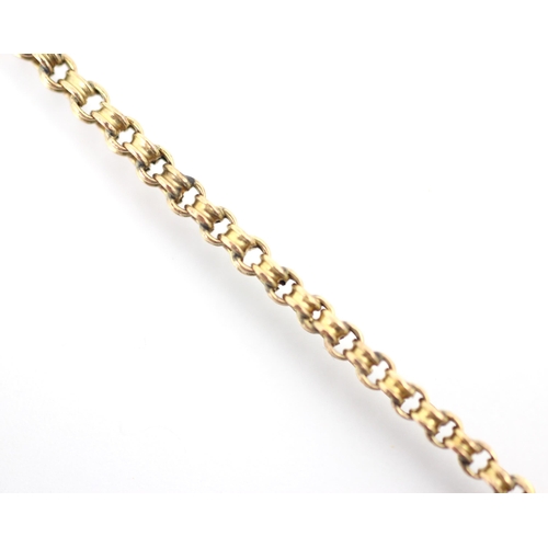 259 - A yellow metal trace link chain, the double grooved links with barrel clasp, fastening stamped 9ct, ... 