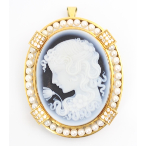 260 - A Giovanni Apa cameo pendant or brooch, the oval blue and white cameo carved depicting young girl fa... 