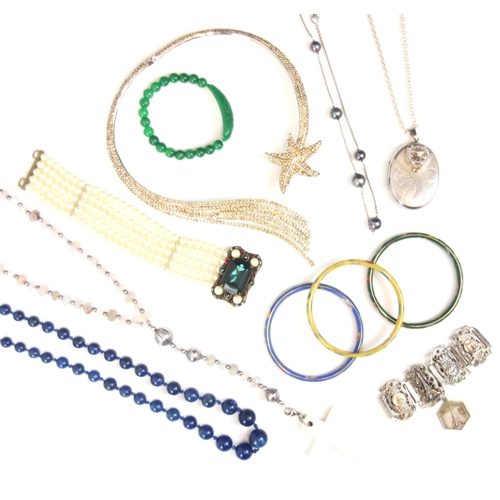 265 - A selection of costume jewellery, including a Chanel style comete necklace, set with paste stones an... 