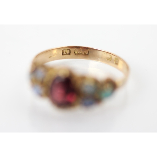 272 - A 19th century garnet and opal ring, the central oval cut garnet within claw setting edge with three... 