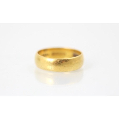 273 - A 22ct yellow gold wedding band, stamped 'HG&S' Birmingham, 'Fidelity', ring size P, 6gms