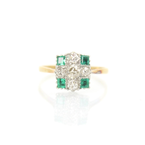 282 - A 20th century Art Deco style diamond and emerald ring, the central old cut diamond with smaller old... 