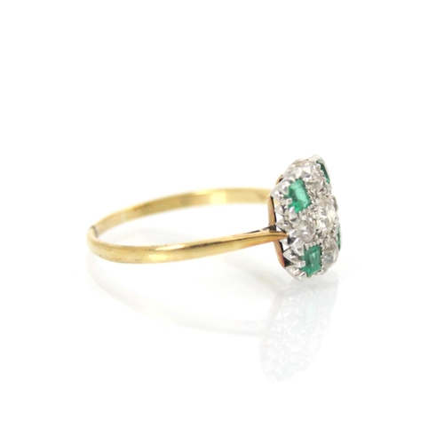 282 - A 20th century Art Deco style diamond and emerald ring, the central old cut diamond with smaller old... 