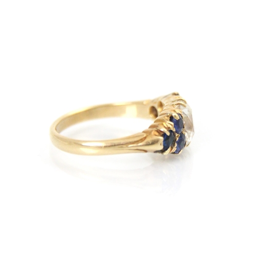 283 - An early 20th century 18ct yellow gold diamond and sapphire ring, the central square old cut diamond... 