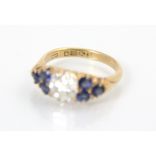 283 - An early 20th century 18ct yellow gold diamond and sapphire ring, the central square old cut diamond... 