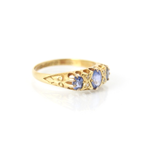 285 - An Edwardian untested sapphire and diamond ring, the central oval cut blue stone with further smalle... 