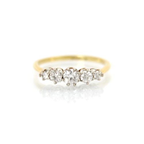 286 - A 20th century five stone diamond ring, the central old cut diamond with two graduated old cut diamo... 