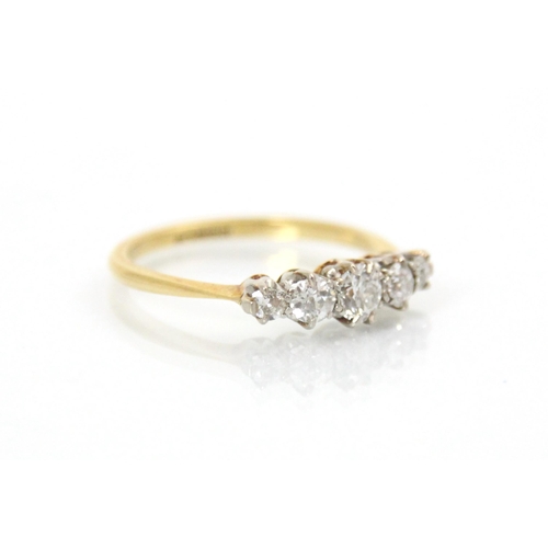 286 - A 20th century five stone diamond ring, the central old cut diamond with two graduated old cut diamo... 