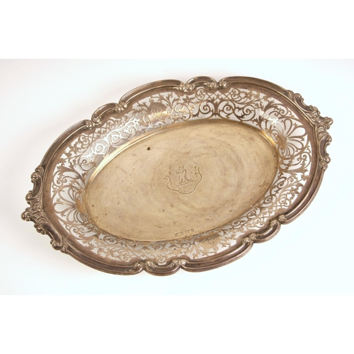 3 - An Edwardian silver dish, Charles Horner, Birmingham 1904, the florally pierced gallery with monogra... 