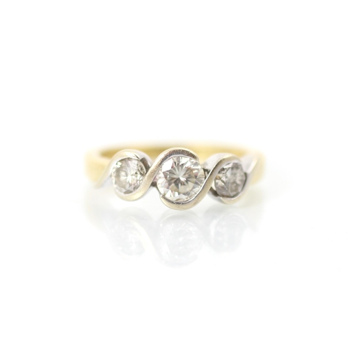 304 - A late 20th century bespoke diamond three stone ring, the three graduated round cut diamonds within ... 