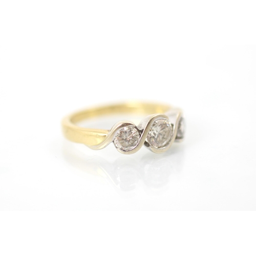 304 - A late 20th century bespoke diamond three stone ring, the three graduated round cut diamonds within ... 