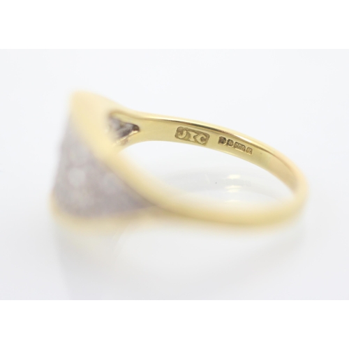 310 - An 18ct yellow gold and diamond dress ring, the lozenge shaped head with pave set diamonds, set to y... 