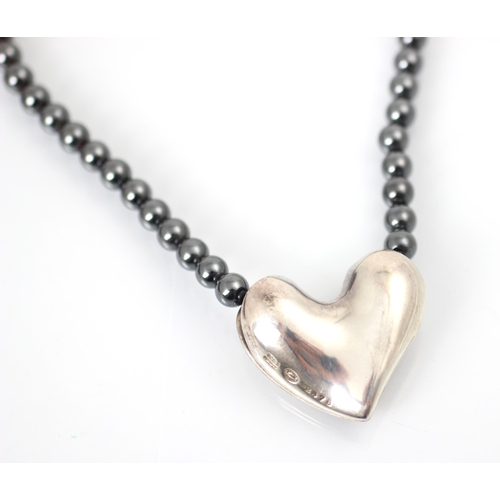 317 - A Georg Jensen silver pendant, the heart shaped pendant stamped 'Georg Jensen 925S Denmark 247B', up... 