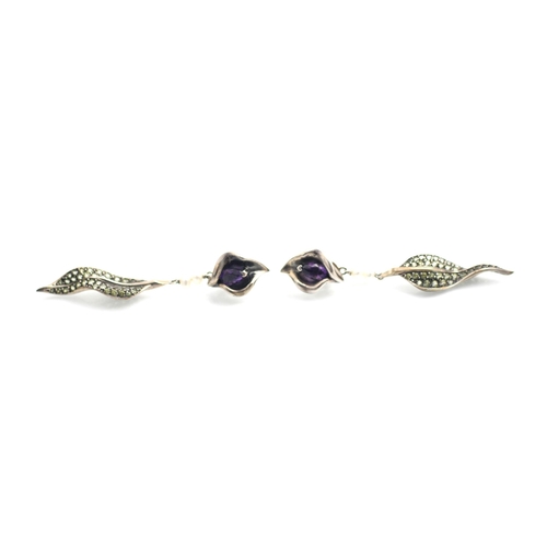 318 - A pair of Shaun Leane silver amethyst 'day and night' earrings, from 'Lilly Collection' the stylised... 