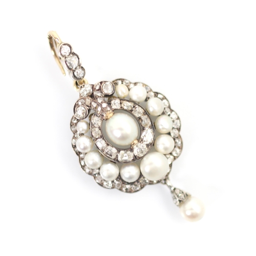 319 - An early 20th century diamond and 'pearl' pendant or brooch, the central 'pearl' surrounded by eleve... 