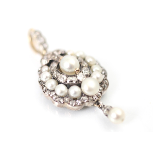 319 - An early 20th century diamond and 'pearl' pendant or brooch, the central 'pearl' surrounded by eleve... 