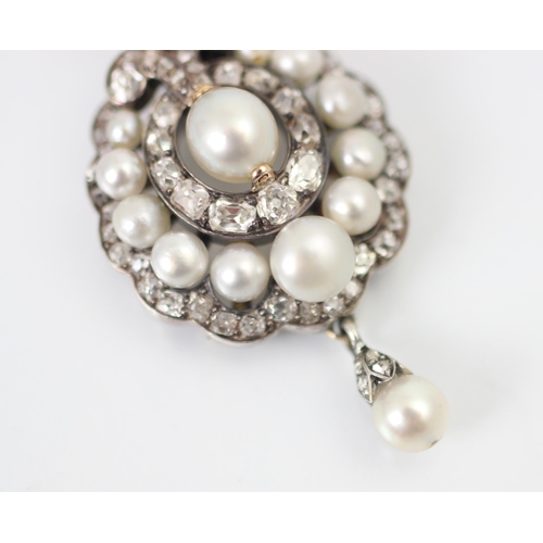 319 - An early 20th century diamond and 'pearl' pendant or brooch, the central 'pearl' surrounded by eleve... 