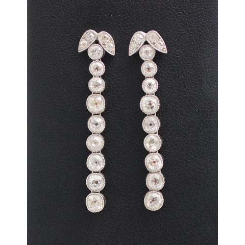 321 - A pair of 20th century style diamond drop earrings, the earrings designed as nine old cut diamonds i... 