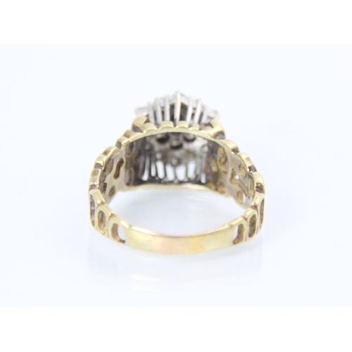 332 - An 18ct yellow gold diamond cluster ring, the raised diamond set cluster within claw set white metal... 