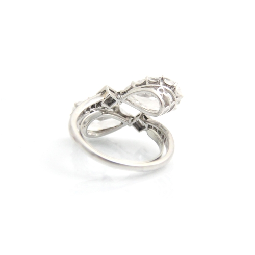 338 - A 20th century old cut pear cut diamond ‘toi et moi’ ring, the two old cut pear cut diamonds claw se... 