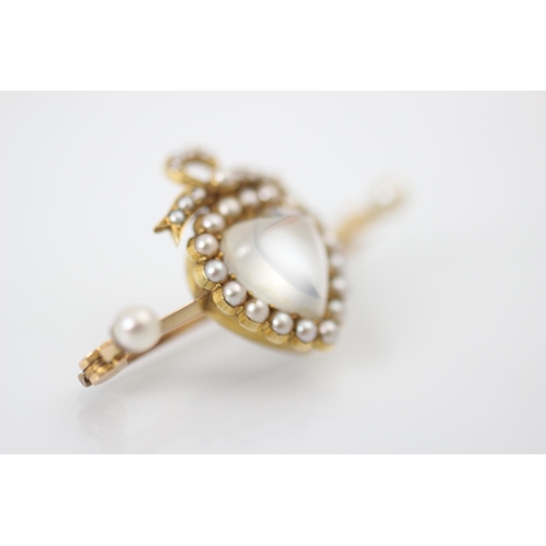 353 - A 19th century style untested moonstone and split pearl locket back brooch, the heart shaped 'moonst... 