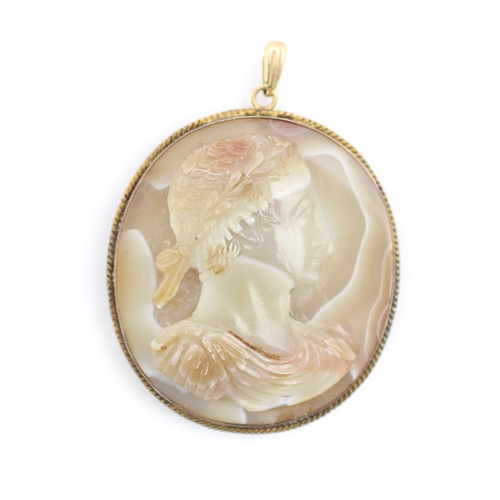 355 - A banded agate carved cameo, the oval cameo carved to depicting Julius Caesar facing dexter, within ... 