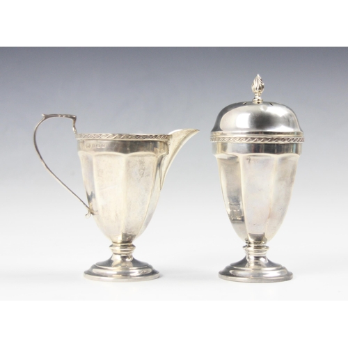 36 - A George V silver strawberry set, Elkington and Co, Birmingham 1927-1928, comprising cream jug and s... 