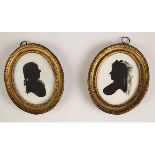 361 - Manner of John Miers (British, 1758-1821),  
A pair of oval bust length portrait silhouettes on plas... 