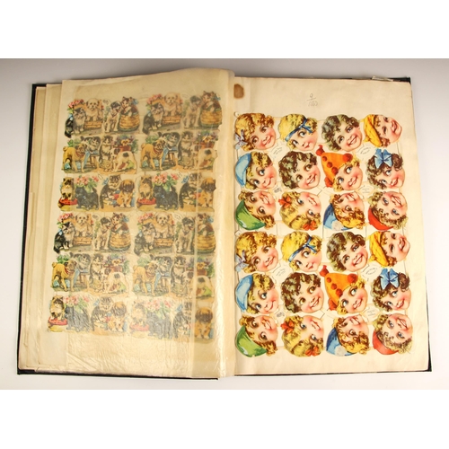 422 - A Raphael Tuck & Sons tradesman's samples scrap album, early 20th century, containing a variety of s... 