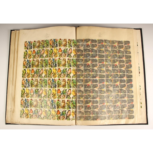 422 - A Raphael Tuck & Sons tradesman's samples scrap album, early 20th century, containing a variety of s... 