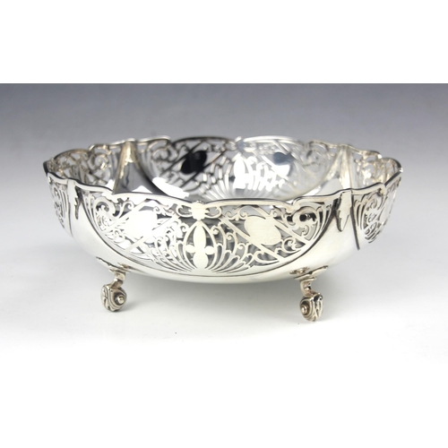 50 - A George VI silver bowl, Joseph Rodgers and Sons, Sheffield 1938, the openwork scroll detailed bowl ... 