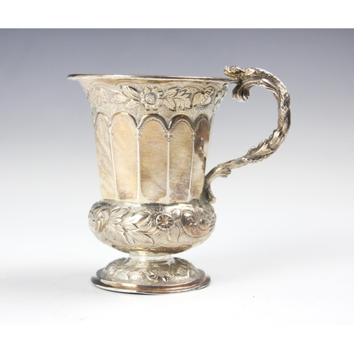 61 - A George IV silver christening mug, Thomas Edwards, London 1825, the scroll handle with cast serpent... 