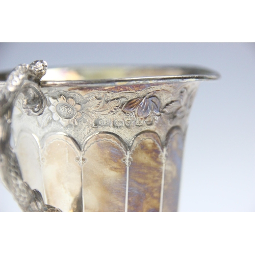 61 - A George IV silver christening mug, Thomas Edwards, London 1825, the scroll handle with cast serpent... 