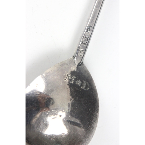 64 - A James I silver spoon, London 1605, the fig shaped bowl with initial 'MD' to reverse, leading to pl... 