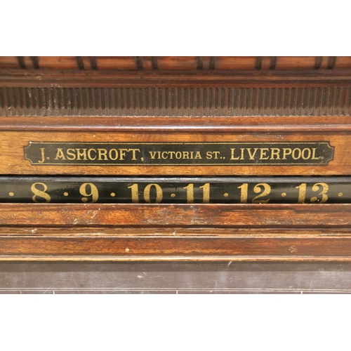 738 - A walnut snooker/billiard scoreboard, by J.Ashcroft, Liverpool, late 19th/early 20th century, the ce... 