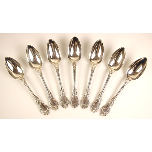 79 - A set of seven 19th century French silver tablespoons, the scrolling decorated spoon with initial to... 