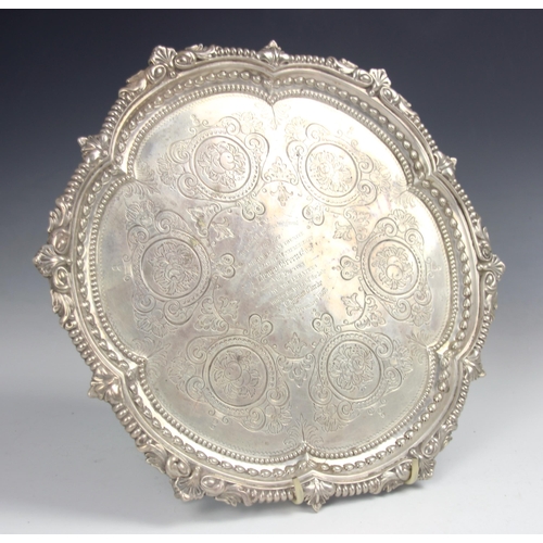 84 - A Victorian silver salver, Martin, Hall and Co, London 1881, the gadroon style rim with leaf detail ... 